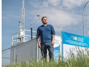 Air quality specialist Robert Chrobak stands Wednesday beside the new state-of-the-art Ardrossan air monitoring station.