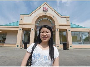 U of A researcher Feng Qui in front of a south side Safeway store. (Photo by John Lucas/Edmonton Journal)