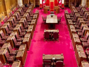 The Senate chamber on Parliament Hill, as seen in this May 28, 2013 file photo. If Canadians are serious about reforming the Red Chamber, they should first look at whittling back the current number of senators, writes E.W. Bopp.