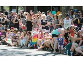 Spectators lined the streets in Old Strathcona to watch the Edmonton Pride Parade on June 6, 2015.