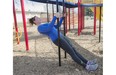 Cat Stebner uses vertical bars for a modified pull up or body-weight row. The higher she grips, the easier the exercise.