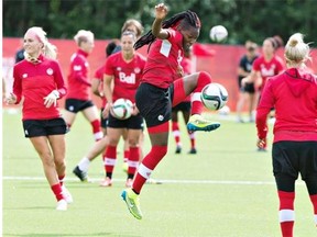 Team Canada's Kadeisha Buchanan, centre, takes part in a drill during a practice session in Edmonton on June 4, 2015. Canada takes on China in their first World Cup match on Saturday, June 6, at Edmonton's Commonwealth Stadium.