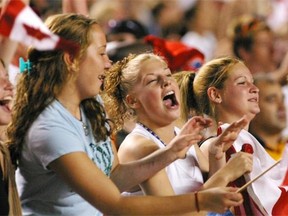 Teenage girls celebrate their soccer heroes after Canada beat Brazil in a shootout Aug. 29, 2002 at the FIFA U-19 Women’s World Championships semi-finals in Edmonton.