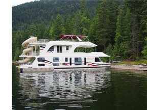 Docking for the evening at Hungry Cove, a popular spot for houseboaters to spend a night on Shuswap Lake.