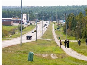 A walking path in Fox Creek: The Alberta Hotel and Lodging Association says a levy imposed by Fox Creek on hotels to pay for infrastructure is illegal.