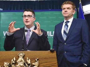 Wildrose Leader Brian Jean, right, and Wildrose house leader Nathan Cooper presented new Wildrose proposals to strengthen Alberta’s legislature and democracy at the Alberta Legislature in Edmonton, May 29, 2015.