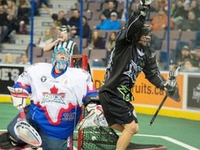 Zack Greer of the Edmonton Rush completes his hat trick on Toronto Rock goalie Brandon Miller in a National Lacrosse League game at Rexall Place on Feb. 27, 2015.