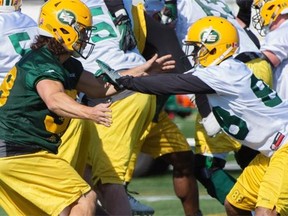 Adam Konar takes part in practice during Edmonton Eskimos training camp at Spruce Grove’s Fuhr Sports Park on June 15, 2015.