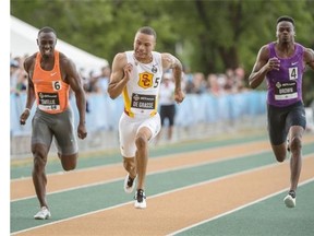 Andre De Grasse ran the mens 100m final with a time of 9.95 at the 2015 Canadian Track and Field Championships at Foote Field in Edmonton. Beside him were Gavin Smellie and Aaron Brown.