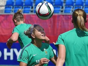 Australia striker Kyah Simon plays with a ball during a training session at Clarke Field on June 24, 2015.