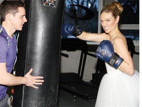 Bride Alex McDonald, in her reception dress, with Jon Boldireff of Fit To Be Bride.