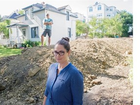 Bridget Stirling and Jeff Cruickshank live in Garneau. They say the contractor working on the infill project next door tore down their fence, filled their window wells with dirt, and banged an excavator bucket into their deck.