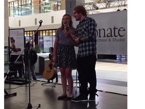 British pop superstar Ed Sheeran shocked a young fan at West Edmonton Mall on Sunday, June 14, 2015, when he walked onstage at a fundraiser to sing one of his hit songs with Sydney Bourbeau.