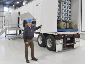 Michael Hribljan, Regional Director-Industrial N. America & Caribbean Water and Process Technologies for G.E. Power & Water, with the mobile water treatment plant in Edmonton on Monday June 29, 2015.