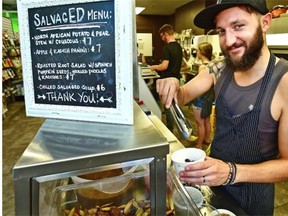 Chef Eric Hanson of Get Cooking prepares a roasted root vegetable salad at SalvagED, a pop-up lunch at Earth’s General Store Cafe. The lunch was held to draw attention to food waste.