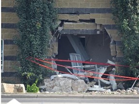 A driver was killed after crashing through a building wall at 178th Street and 118th Avenue in Edmonton on July 10, 2015.