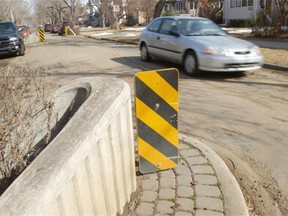 Edmonton city councillors called for quicker fixes to the problem of neighbourhood traffic shortcutting during a meeting Monday, June 22, 2015. A new city policy will make it clear traffic controls — such as lights and stop signs — can be used to slow traffic, not just to improve flow.