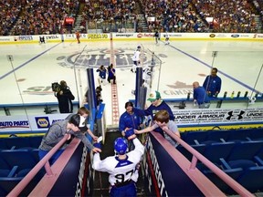 Edmonton Oiler Connor McDavid (97) heads to the ice surface Friday for his first public on-ice session during the orientation camp at Rexall Place in Edmonton.