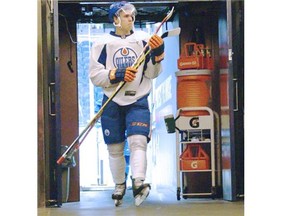 Edmonton Oilers #97 Connor McDavid steps off the ice after his first time skating as an Edmonton Oiler during 2015 orientation camp at Rexall Place in Edmonton on July 1, 2015.