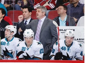 Former San Jose Sharks assistant coach Jay Woodcroft, to Todd McLellan’s right, will join his former head coach on the Edmonton Oilers coaching staff in the 2015-16 NHL season. Jim Johnson, another former Sharks coach, will also be on Edmonton’s staff.