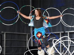 Hoop dancer Kelsey Wolver from Sucker Creek performs onstage at Aboriginal Day Live in Louise McKinney Park on Saturday, June 20, 2015.