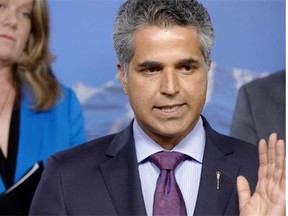 Irfan Sabir, Minister of Human Services, during a press conference to discuss Bill 3 and the NDP’s plan to reinvest in education and health at the Alberta Legislature in Edmonton on June 18, 2015.