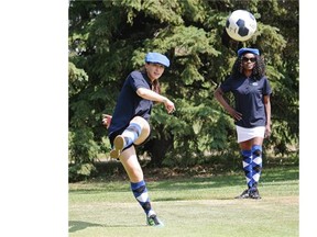 Janelle Janis, left, tees off while playing FootGolf with Harriet Tinka at the Rundle Park Golf Course on June 15, 2015.