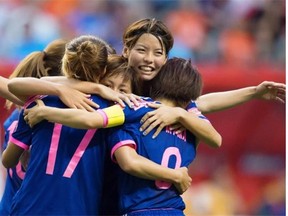 Japan’s Mizuho Sakaguchi celebrates her game-winning goal with teammates in a Women’s World Cup Round of 16 game against the Netherlands at Vancouver on June, 23, 2015.