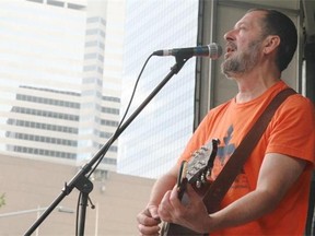 John Guliak performing on Churchill Square, part of The Works Art & Design Festival running through July 1.