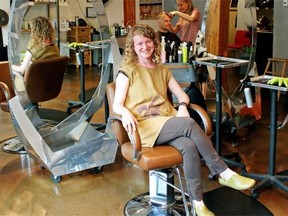 Kelly McPhillamey (front), owner of Echo Hair Salon, an eco/green hair salon located on the second floor of Roots Community Building at 8135 102nd St.