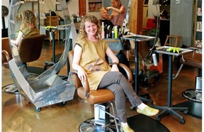 Kelly McPhillamey (front), owner of Echo Hair Salon, an eco/green hair salon located on the second floor of Roots Community Building at 8135 102nd St.