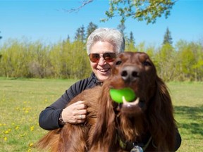 Lorraine Glass works out with her dog, MacGee.