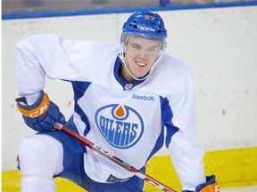 Connor McDavid is clearly crestfallen to be wearing an Oil drop on his sweater.