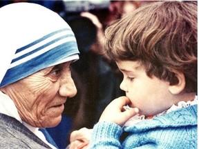 Mother Teresa meets two-year-old Irene Chamberland during the nun’s visit to Alberta in June 1982.