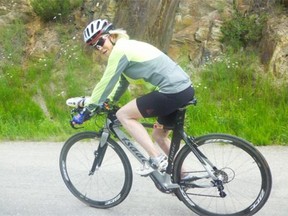 Nancy Taubner, the senior woman on the CASA Cycledelic 1000 bike tour, shows good form near the summit of Kootenay Pass.