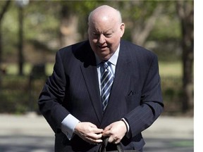 Mike Duffy is shown arriving at the courthouse Thursday May 7, 2015 in Ottawa.