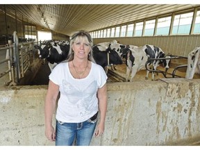 Nita Floryn on her dairy farm near Gull Lake on Thursday, June 18, 2015.