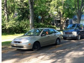 Two cars towed and left on 106th Avenue, near 128th Street. Cliff’s Towing says the central neighbourhood is a convenient place to leave cars it has towed from the downtown core at the city’s request.