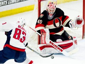 Ottawa Senators goalie Robin Lehner makes a save on Washington Capitals centre Jay Beagle during a National Hockey League game on Feb. 5, 2015, in Ottawa.