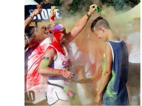 Participants at the Color Me Rad 5K run held at Rundle Park in Edmonton on July 3, 2015. Color Me Rad is loosely based on the Hindu Festival of Colors, otherwise known as Holi.