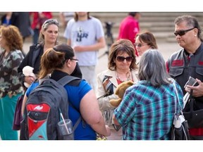 People from all over Canada attend a vigil at the Alberta legislature where 775 candles and teddy bears were laid out on the steps of the Legislature to remember the 775 children who have died in care since 2009. Taken on June 22, 2015 in Edmonton.