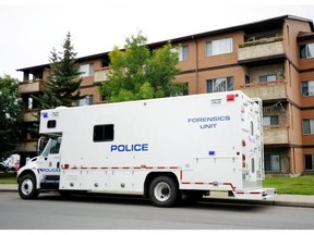 Police investigate a homicide at an apartment at 14908-26 St. on Sept. 9, 2010. Andrew Patrick McPherson was stabbed to death.