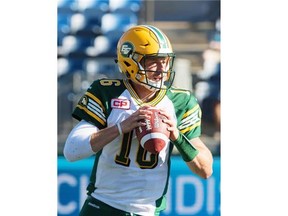 Quarterback Matt Nichols of the Edmonton Eskimos gets set to throw the ball during a Canadian Football League game against the Toronto Argonauts at Fort McMurray on June 27, 2015.