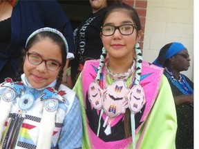 Kyra Morin, 10, and Kimana Gillis, 12, get ready for the round dance at Parkdale School in northwest Edmonton to celebrate this weekend’s National Aboriginal Day.