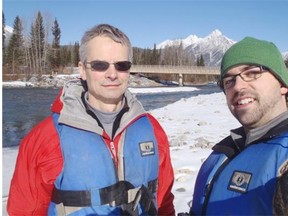 University of Alberta professor Mark Loewen (left) and PhD student Vincent McFarlane at work on the Kananaskis River on Feb. 28, 2015. Loewen’s research is based on the Kananaskis, North Saskatchewan and Peace rivers.