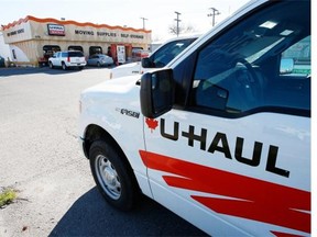 Vehicles parked in front of a U-Haul store in Winnipeg.