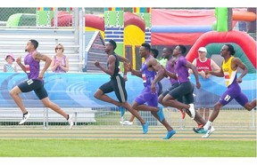 U.S.A.’s Wallace Spearmon, far left, wins the men’s 200-metre sprint competition with a time of 20.21 seconds during the Track Town Classic at Foote Field on Sunday.