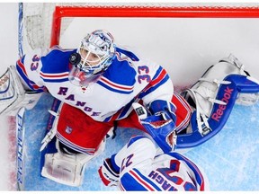 New York Rangers goalie Cam Talbot watches a puck go past him during the third period of an NHL hockey game against the Los Angeles Kings on Jan. 8, 2015, in Los Angeles. The Oilers acquired Talbot Saturday in exchange for draft picks.