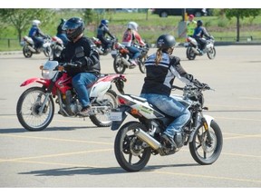 The Canadian traffic education centre motorcycle training course at the Servus Place Credit Union parking lot in St. Albert, July 28, 2015.