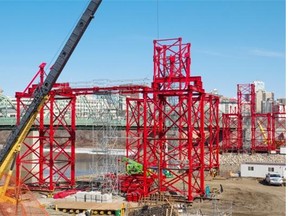 Construction crews work on the Walterdale Bridge Replacement Project in Edmonton on April 8, 2015.